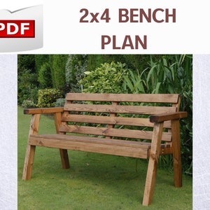 May include: A wooden bench made from 2x4 lumber. The bench has a slatted back and a wide seat. The bench is stained a dark brown color and is sitting on a grassy lawn.