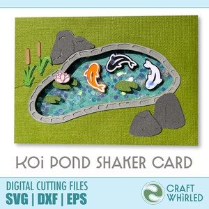 May include: A green card with a cut-out koi pond shaker card design. The pond is filled with blue glitter and has a gray border. There are four koi fish, two gray rocks, a pink water lily, and green lily pads. The text "Koi Pond Shaker Card" is at the bottom of the card.