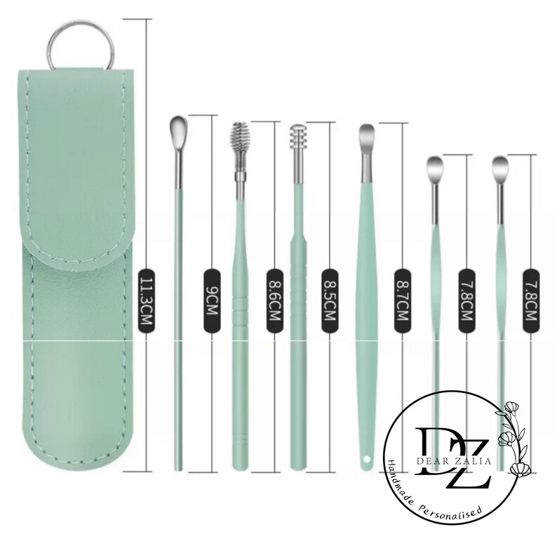 May include: Set of 7 green ear cleaning tools with different tip shapes and sizes, ranging from 7.8 to 11.3 cm in length, with a green leather carrying case.