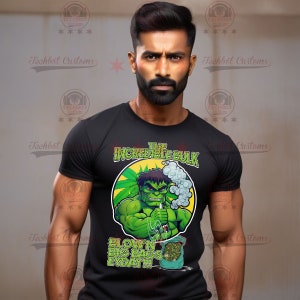 May include: A black t-shirt with a green cartoon character wearing a green bandana and holding a joint. The character is surrounded by green marijuana leaves. The text "The Incredible Bulk" is above the character and the text "Blow'n Big Bags Eyday!!" is below the character.
