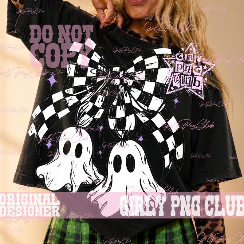 May include: A black t-shirt featuring a large graphic of two white ghosts hanging from a black and white checkered bow. The design includes small purple star accents and a star-shaped logo containing the text GIRLY PNG CLUB in white.