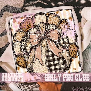 May include: A graphic print on a light-colored garment featuring a stylized turkey with a large pink bow. The turkey is decorated with various patterns including leopard print, black and white buffalo plaid, and stripes. The text GIRLY PNG CLUB is visible.