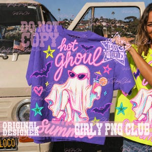 May include: A purple t-shirt with the words "hot ghoul" in pink and white, featuring a ghost wearing sunglasses and holding a cocktail. The shirt has star and bat graphics, and the text "Summer Girly PNG Club".