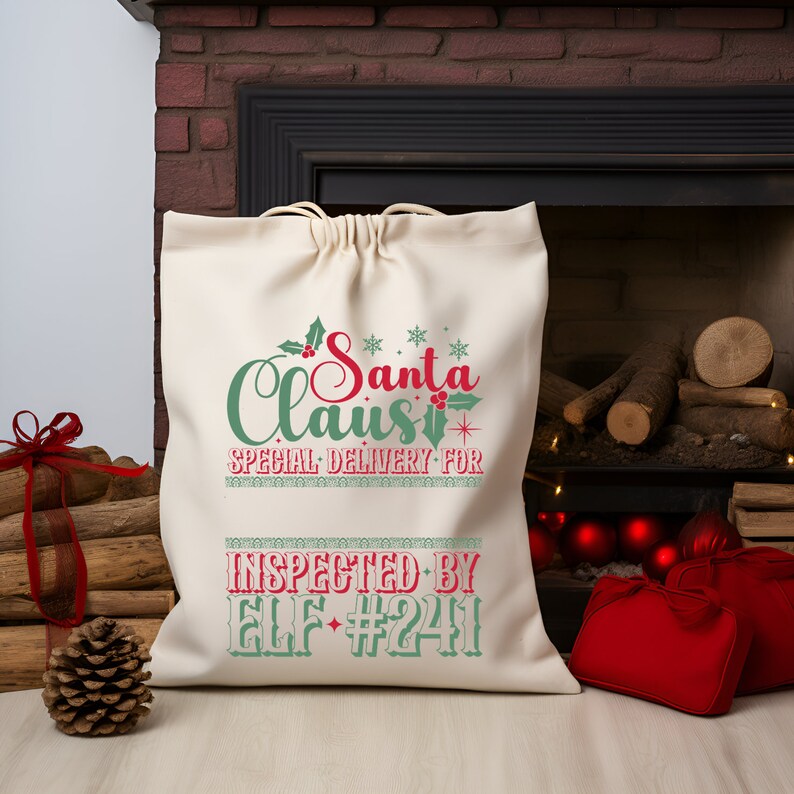 May include: A white canvas Santa sack with green and red text that reads "Santa Claus Special Delivery For Inspected By Elf #241".