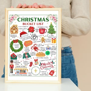 Pu&ograve; includere: Una stampa incorniciata della lista dei desideri di Natale. L'elenco include attivit&agrave; festive come decorare un albero, cuocere biscotti e scrivere lettere a Babbo Natale. Le parole "Christmas Bucket List" sono in alto, su sfondo beige.