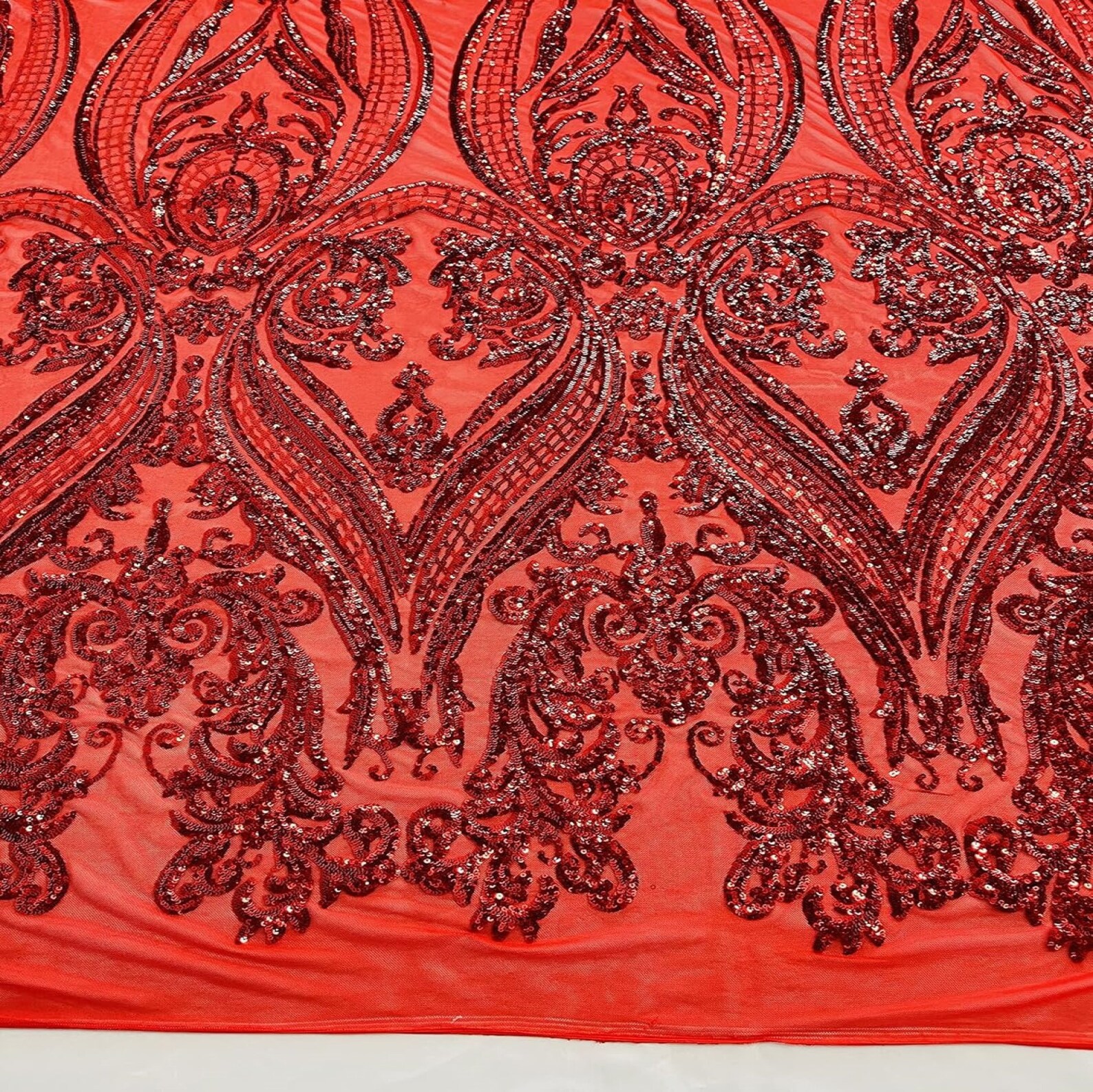 Empire damask design with sequins embroider on a 4 way stretch mesh fabric-sold by the yard. Olive