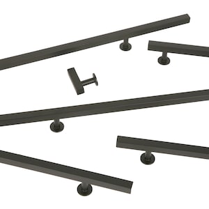 May include: A collection of matte black cabinet pulls and handles in various sizes. The hardware features a modern, geometric design with a hexagonal bar shape and circular mounting bases. Ideal for kitchen or bathroom cabinetry.