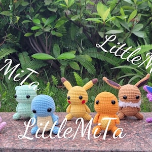 May include: A collection of ten crocheted Pokemon characters, including Pikachu, Eevee, Bulbasaur, Squirtle, Charmander, and others. The characters are arranged in a line on a stone surface with green plants in the background. The text "Little Mita" appears three times in the image.
