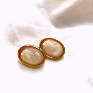 Carved resin Cameo Clip on earrings in oval gold tone Metal frame