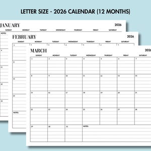 May include: A stack of three letter-size 2026 monthly calendars. The calendars are white with black text, displaying the months of January, February, and March. The top of each calendar has the year 2026.