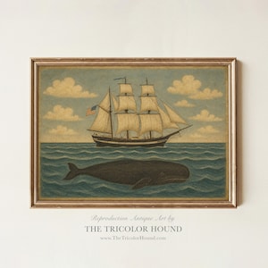 May include: A framed art print featuring a sailing ship with white sails and an American flag on a blue ocean with a large dark whale swimming below. The sky is light blue with fluffy clouds. The text reads Reproduction Antique Art by THE TRICOLOR HOUND.