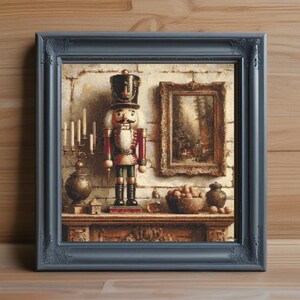 May include: A framed cross-stitch artwork depicting a nutcracker soldier, a small painting, and a candle holder on a mantelpiece. The frame is a muted blue-grey, and the background has a brick-like texture. The artwork evokes a traditional, festive theme.