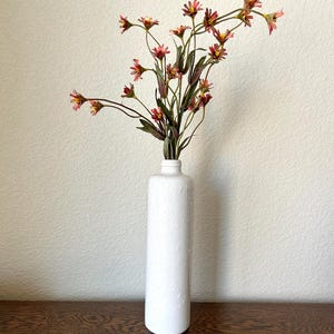 Vintage German utilitarian speckled white crock liquor bottle - collectable rustic farmhouse home decor - flower vase - collectible vessel