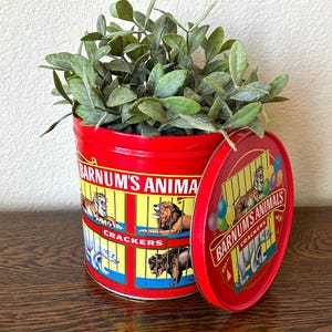 Vintage 1991 Barnum’s Animals Crackers red advertising tin with lid - cylinder cookie canister - collectable storage container