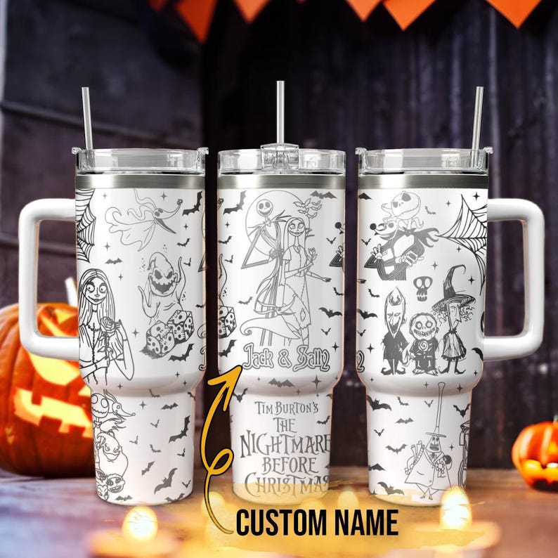 May include: Three white stainless steel tumblers with black and white illustrations of characters from Tim Burton's The Nightmare Before Christmas. The tumblers feature Jack Skellington, Sally, and other characters from the film. The text "Jack & Sally" and "Tim Burton's The Nightmare Before Christmas" is printed on the tumblers. The tumblers have a straw and a lid.