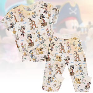 May include: A pirate-themed pajama set featuring cartoon characters. The set includes a short-sleeved top and trousers, both decorated with images of Mickey Mouse, Donald Duck, and other characters dressed as pirates, along with treasure chests and ships.