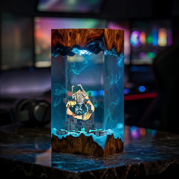 A handcrafted resin and epoxy wood diorama lamp featuring Midna from Zelda: Twilight Princess — glowing scene-in-a-lamp art that doubles as a night light.