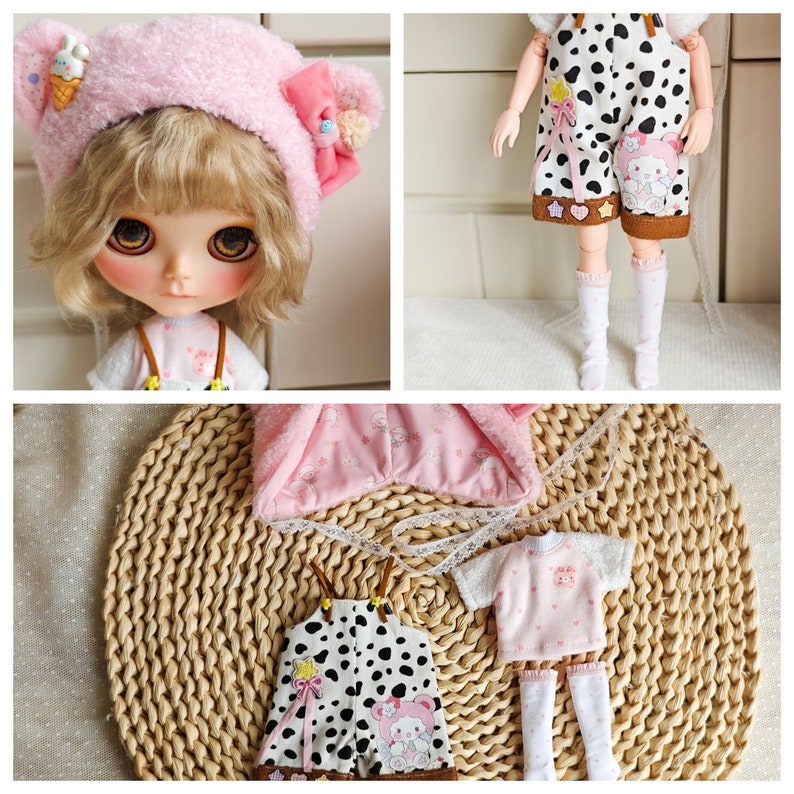 May include: A set of doll clothes featuring a pink hooded jacket, a white and pink t-shirt, a black and white polka dot overall, and white socks with pink polka dots.