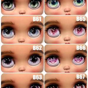 May include: A set of 8 pairs of doll eyes, each pair labelled with a number from B60 to B67. The eyes are various colours, including green, blue, pink, and purple, with different designs and patterns.