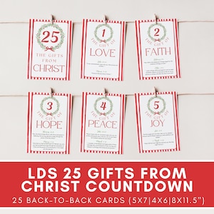 May include: A set of seven red and white striped cards with text and numbers, hanging from a string. The cards feature the words "The Gift of Love", "Faith", "Hope", "Peace", and "Joy". The top card reads "25 The Gifts From Christ".