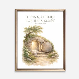 Op de afbeelding: Ingelijste aquarelprint met een open graf met een stenen deur en trappen, omgeven door groen. De tekst "HE IS NOT HERE: FOR HE IS RISEN" staat bovenaan, uit Mattheüs 28:6. Het kunstwerk heeft een zacht, pastelkleurig kleurenpalet.