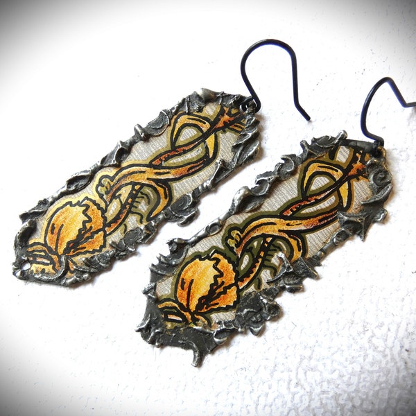 Earrings made from old tin can with stamped tin border