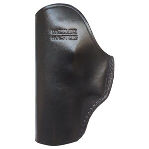 May include: Black leather holster with the text "DAZZLING HOLSTERS" embossed on the front.