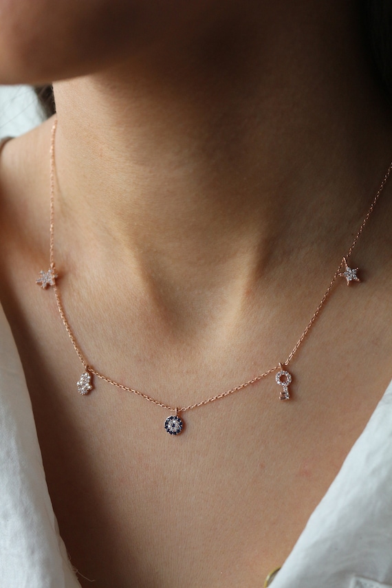 Collier à breloques • Plaqué or 14 carats • Pendentif mauvais œil