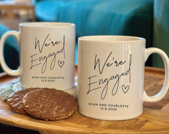 Set Of Two Personalised We're Engaged Mugs