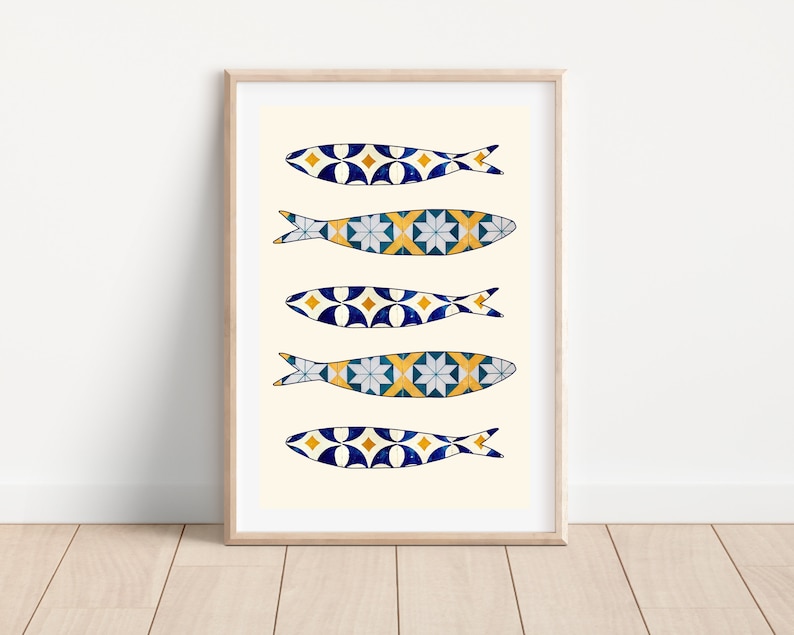 May include: A printable art print featuring five stylized blue, yellow, and white fish with geometric patterns, reminiscent of Portuguese tiles. The fish are arranged vertically on a cream background.