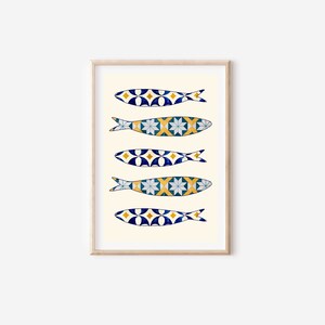May include: A framed print of five stylized fish with a blue, white, and yellow geometric pattern. The fish are arranged vertically in a row.