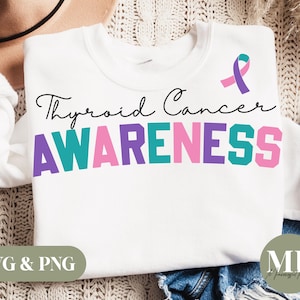 May include: White sweatshirt with the text "Thyroid Cancer AWARENESS" in pink, purple, and teal letters. A pink and purple ribbon is in the top right corner of the shirt.