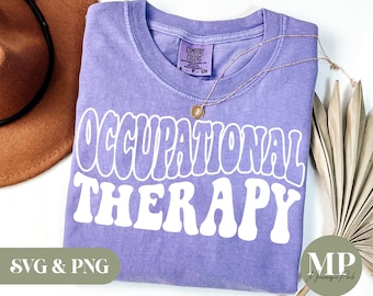 May include: Purple t-shirt with white text that reads "Occupational Therapy" in a retro font.