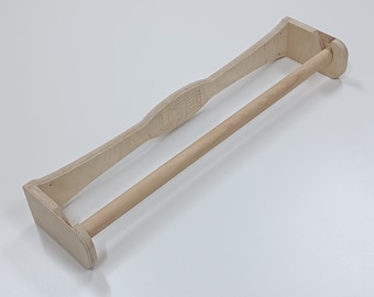 Wooden pull-up bar, wall-mounted, above the door
