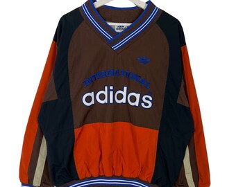 Vintage Adidas International Block colour Big Logo V Neck Sweatshirt Size M-L
