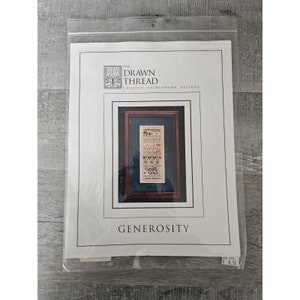 May include: A white cross-stitch pattern chart for a needlepoint project titled "Generosity" by The Drawn Thread. The chart features a framed image of a cross-stitch design with a blue background and a brown frame. The price is £6.50.