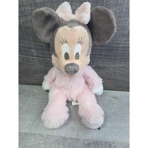 Auténtico peluche de Minnie Mouse de Disney Parks con sonajero, rosa, 25 cm, b290 imagen 1