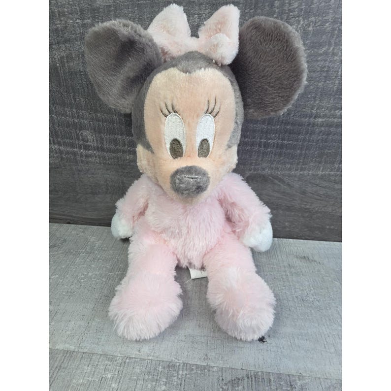 Auténtico peluche de Minnie Mouse de Disney Parks con sonajero, rosa, 25 cm, b290 imagen 1
