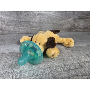 May include: A rustic wooden sign with the text "Welcome to our home" in white lettering. The sign features a distressed finish and a simple, inviting design, perfect for entryway decor.