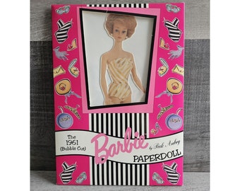 Les poupées Barbie Paper Dolls vintage de Peck Aubry, 1994, ont scellé la nouvelle coupe bulle de 1961