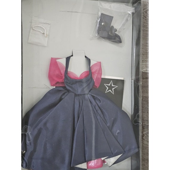 navy dress with pink accessories The Heathered Navy Suit paired with our Light Pink accessories , A Spring wedding look thats classy, yet guaranteed to turn heads., Ready to secure the suits for your big day? Choose Book an