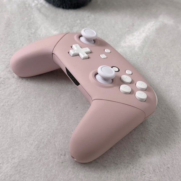 Nintendo Switch Pro Controller, gepersonaliseerd in kersenbloesemroze met witte knoppen