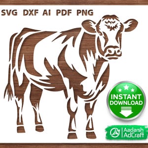 以下が含まれることがあります： 上部に「SVG DXF AI PDF PNG」の文字が入った、茶色と白の牛のシルエットデザイン。画像には、緑色の「インスタントダウンロード」ボタンと「Aadarsh AdCraft」のロゴが含まれています。