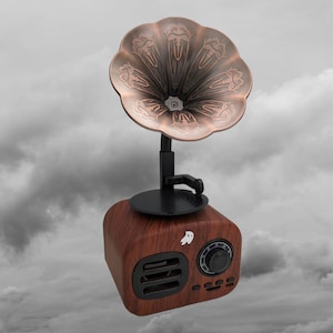 May include: A vintage-style wooden speaker with a black turntable and a copper-coloured horn. The speaker has a small white ghost logo on the front.