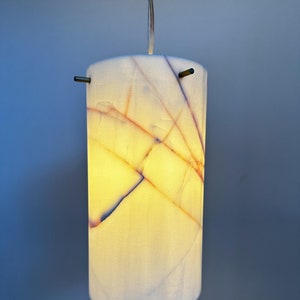 Dolamite Natural Stone Pendant Light. Milky White with colored figures.