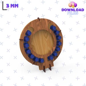 May include: A wooden coffee pod holder with a circular design and 12 slots for coffee pods. The holder is made of wood and has a natural finish. The coffee pods are blue and white.