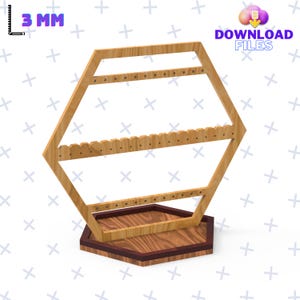 May include: Wooden hexagonal earring stand with three tiers of holes for storing earrings. The stand has a hexagonal base with a dark wood trim.