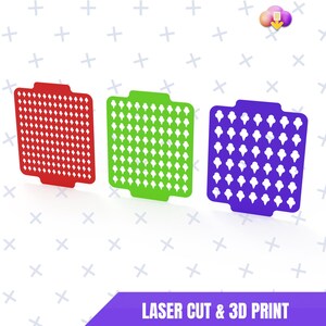May include: Three brightly coloured laser-cut and 3D printed stencils. The stencils are red, green, and purple. The red stencil has a diamond pattern, the green stencil has a teardrop pattern, and the purple stencil has a teardrop pattern. The text "LASER CUT & 3D PRINT" is at the bottom.