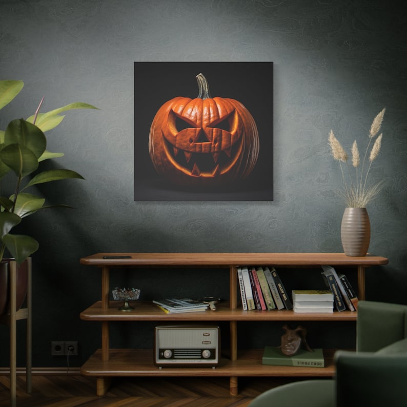May include: A carved orange pumpkin with a scary face on a black background. The pumpkin is lit from the inside, making the face glow.