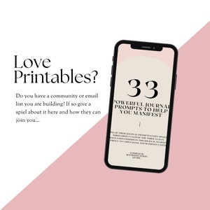 May include: A pink and white phone screen displaying a digital download for a 33-day journal with prompts to help you manifest. The text on the screen reads "33 Powerful Journal Prompts to Help You Manifest".